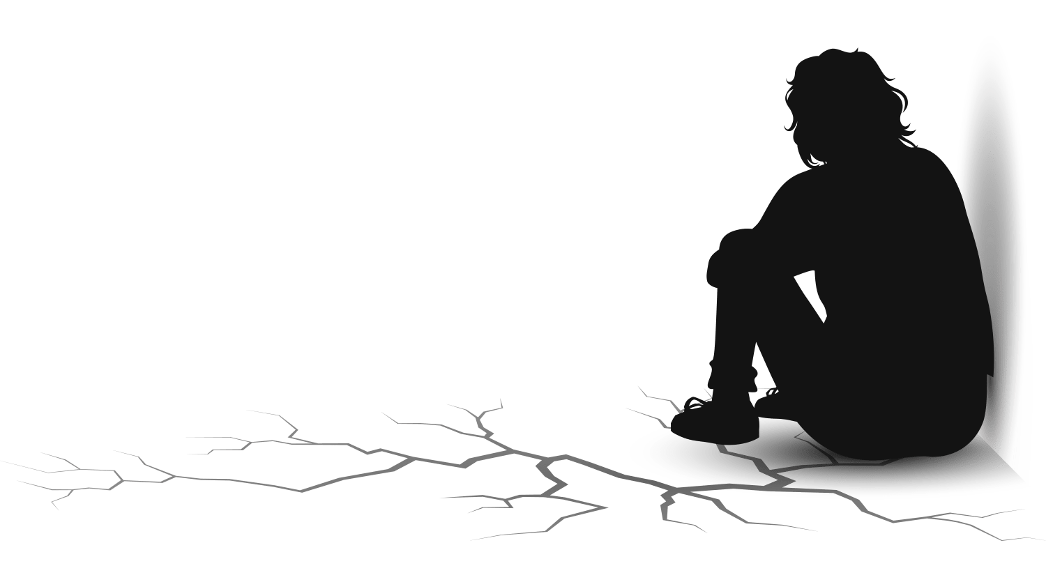 Person silhouette sitting on the cracked floor